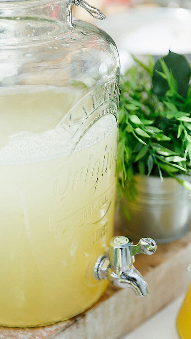 Stylish glass Kilner drink dispensers look great serving up cool summer wedding drinks to guests