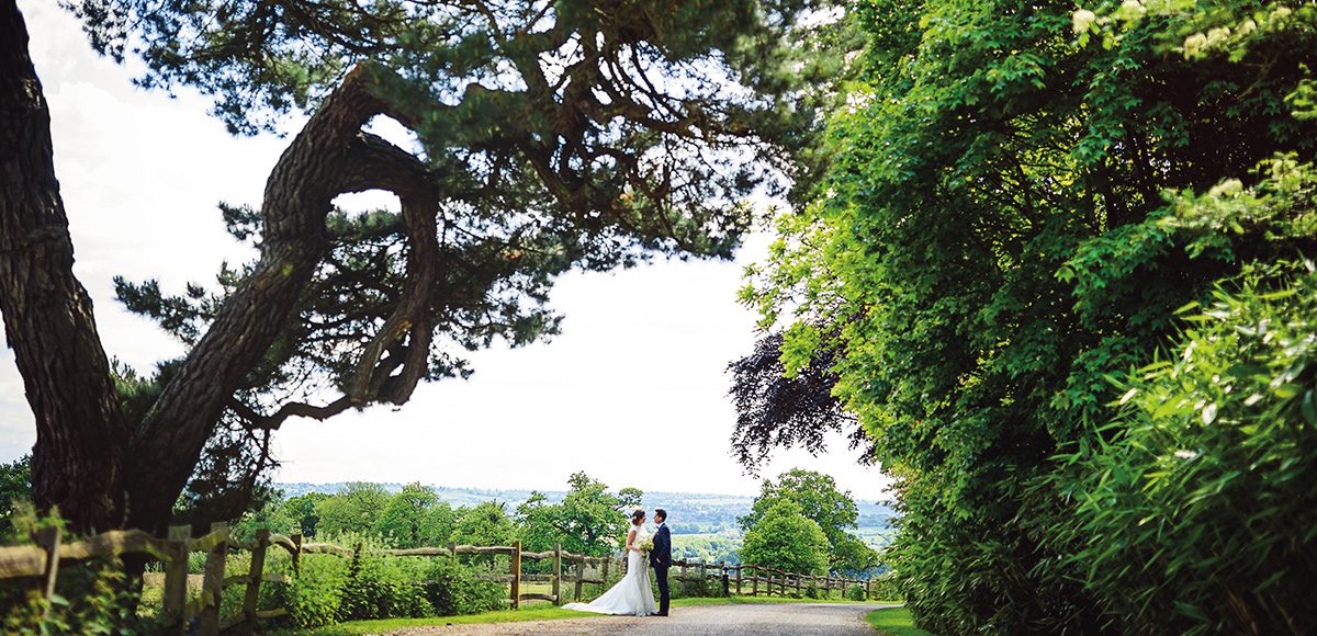 Newlyweds explore the stunning Essex countryside that surrounds Gaynes Park wedding venue